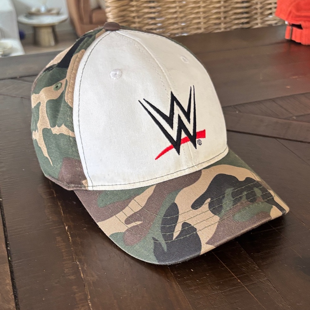 vintage WWE logo camo snapback hat signed by john cena